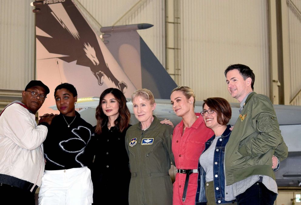 "Captain Marvel" cast members Samuel L. Jackson, Lashana Lynch, Gemma Chan and Brie Larson, along with directors Ryan Fleck and Anna Boden, take a photo with Gen. Jeannie Leavitt in front of an Air Force F-15 Eagle at Edwards Air Force Base, Calif., Feb. 20, 2019.Shannon Collins/DoD