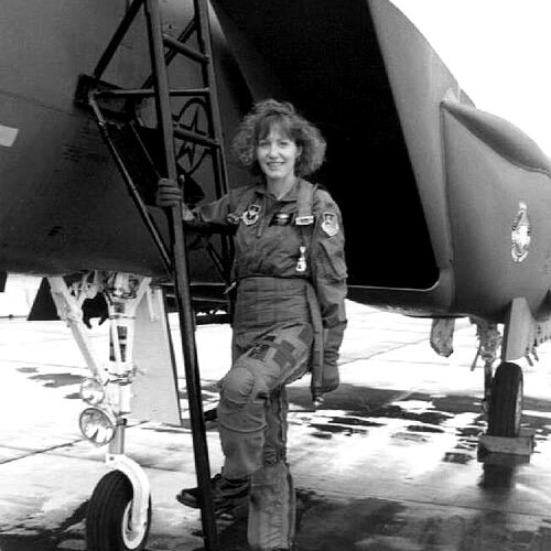 LEAVITT POSES WITH HER F-15E STRIKE EAGLE IN FEBRUARY 1994. PHOTO CREDIT: U.S. AIR FORCE.