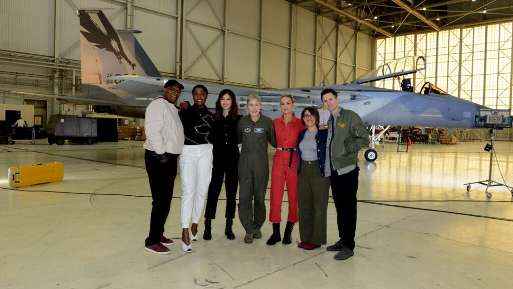 THE CAST OF “CAPTAIN MARVEL” POSE WITH LEAVITT. PHOTO FROM LEAVITT PERSONAL COLLECTION.